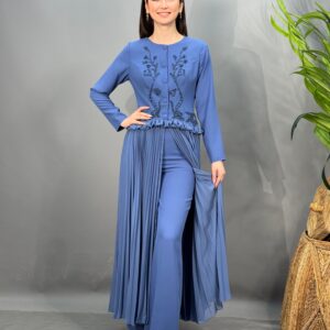 Stunning lunar blue jumpsuit with georgette pleated attached overskirt. Beautiful beadwork detail on the button down bodice complete this elegant ensemble.  Also available in black.